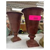 Two Rust-Colored Metal Vases