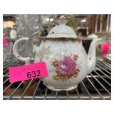 Decorative White Porcelain Teapot with Floral Desi
