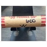 Paper-Wrapped Roll of Pennies Marked 600