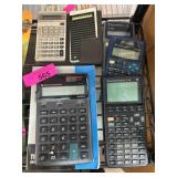 Six Texas Instruments Calculators