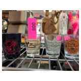 Four Collector Shot Glasses