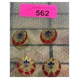Four Enamel and Brass Pins with Fleur-de-Lis