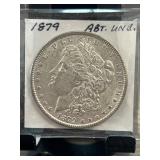 1879 Morgan Silver Dollar in About Uncirculated Co