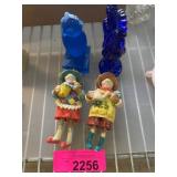 Figurines and Blue Glass Sculptures