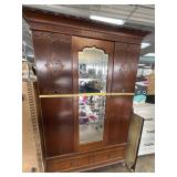 Carved Wood Armoire With Mirrored Door