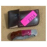 Folding Knife with Case Featuring Damascus Blade