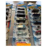 Seven Packaged Hot Wheels Cars