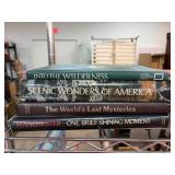 Four Hardcover Books on Various Topics