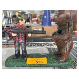Cast Iron Figural Hunter and Bear Coin Bank