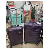 Two Purple Hard-Shell Suitcases with Spinners
