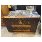Wooden and Metal-Banded Trunk With Decorative Inte