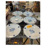 Blue and White Ceramic Plates with Floral Motif