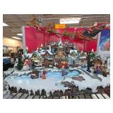 Holiday Village Scene With Flying Santa 13in