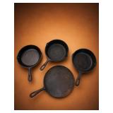 Four Cast Iron Cookware Pieces
