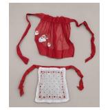 Two Red And White Festive Aprons