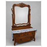 Wooden Dresser With Ornate Mirror