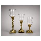 Three Brass and Glass Candlesticks