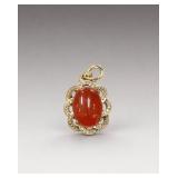 Gold Tone Pendant with Red Jade Cabochon