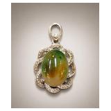 Oval Jade Cabochon Pendant in Metal Setting