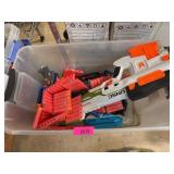 Bin of Nerf Blasters and Foam Darts