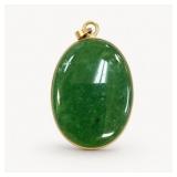 Oval Green Jade Pendant with Gold Tone Frame