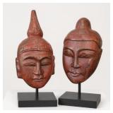 Red Asian-Style Face Sculptures