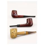 Three Smoking Pipes