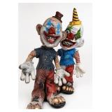 Two Creepy Clown Figurines