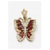 Gold Tone Butterfly Pendant with Garnet Accents