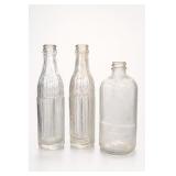 Third City and Other Embossed Soda Bottles