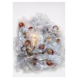 Approximately 50 Red Stone Pendants with Gold Tone