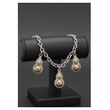 One Chanel-Marked Two-Tone Charm Bracelet
