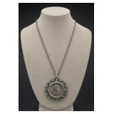 or brand is identified 1979 Susan Dollar Necklace