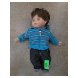 Girl Doll Wearing Blue Hooded Jacket