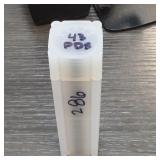 1980 White Plastic Coin Holder Handwritten Marks