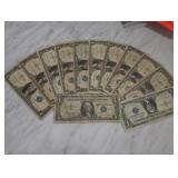 Twelve 1935'1957 $1 Silver Certificates