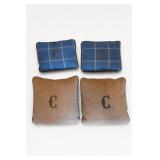 Lot of Four C-Marked Throw Cushions
