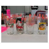 Four Coca-Cola-Related Promotional Glasses