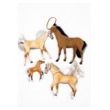 Four Assorted Toy Horse Figures