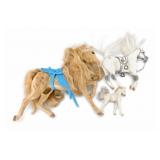 Three Plastic Toy Horse Figures with Saddles