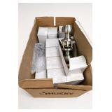 Boxed Merchandise And Metal Device Lot