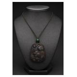Carved Jade Dragon And Tiger Pendant