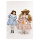 Pair Of Dressed Dolls With Stands