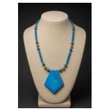 Blue Beaded Pendant Necklace With Brass Accents