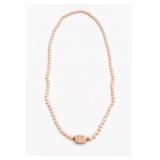 Angel Skin Coral Bead Necklace With Carved Center