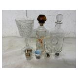 4 SHOT GLASSES  VASE AND 2 DECANTERS
