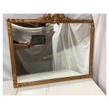 ORNATELY FRAMED MIRROR