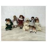 8 PORCELAIN DOLLS