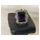 DINNER RING WITH PURPLE AND CLEAR STONES SIZE 7