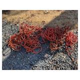 Bundle of Red Rubber-Coated Electrical Cables